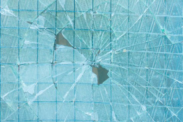 istock Broken decorative and glossy glass block window as a texture or for background. The wall. Geometric background. 657170950