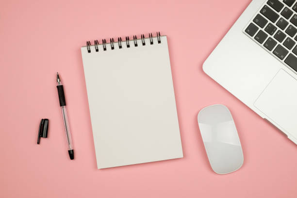 istock Top view flat lay picture with blank notepad page and different accessories on colored surface 657173908