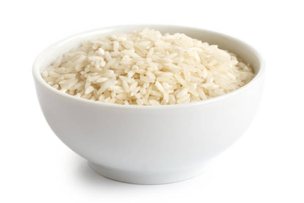 istock Bowl of long grain white rice isolated on white. 657174130