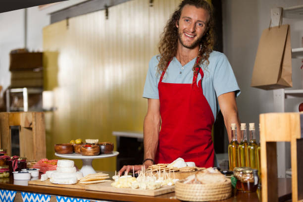 istock Portrait of staff standing at counter 657174380
