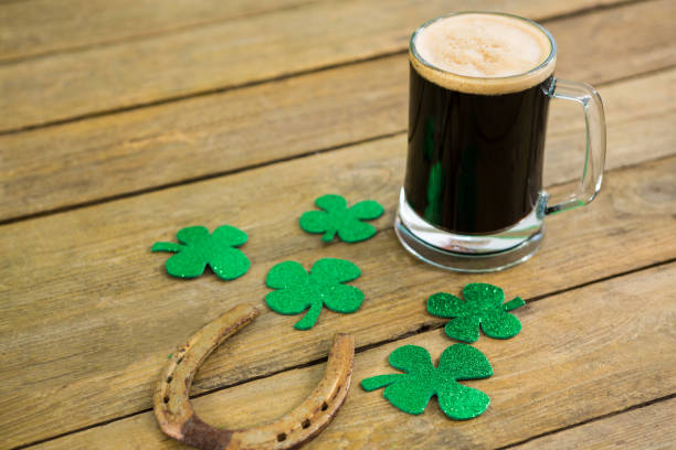istock St Patricks Day green beer with shamrock and horseshoe 657174926