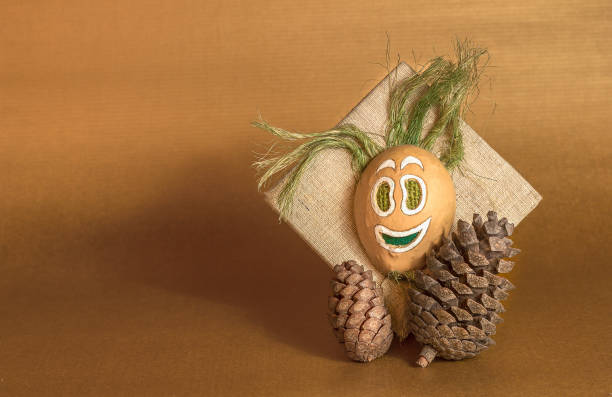 istock Pine cone and wood grass mask abstract art decoration 657174938