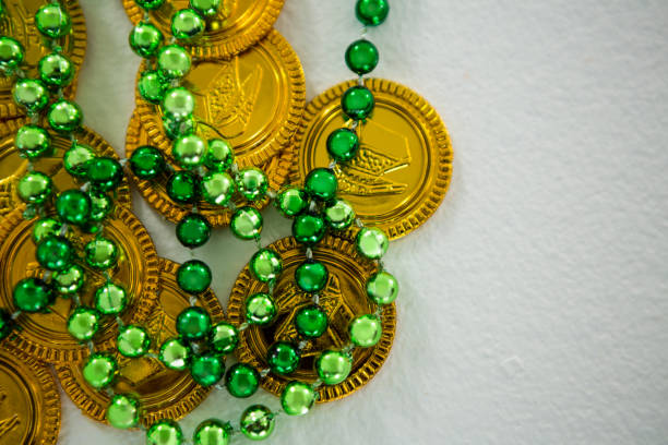 istock St Patricks Day gold chocolate coin and beads 657175026