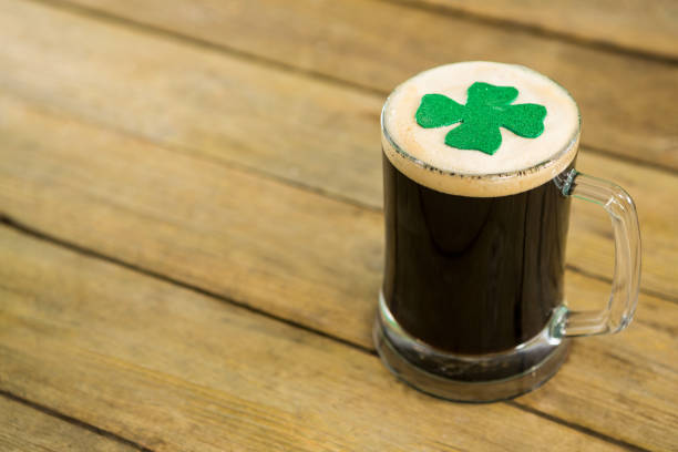 istock St Patricks Day mug of beer with shamrock 657175152