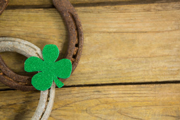 istock St Patricks Day shamrock with two horseshoes 657177544