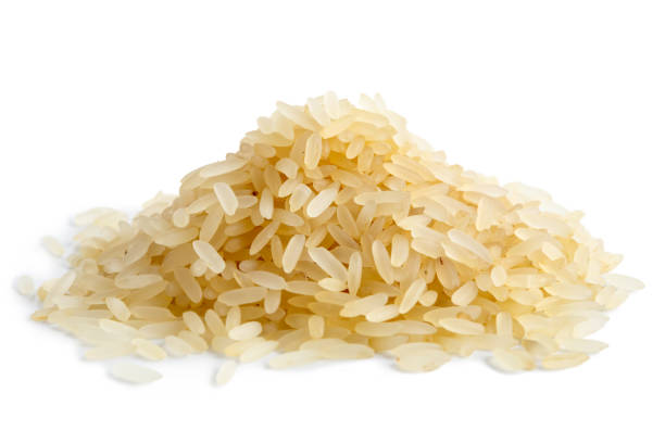 istock Pile of long grain parboiled rice isolated on white. 657178338