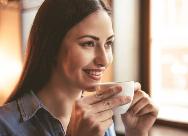 istock Beautiful girl at the cafe 657181854