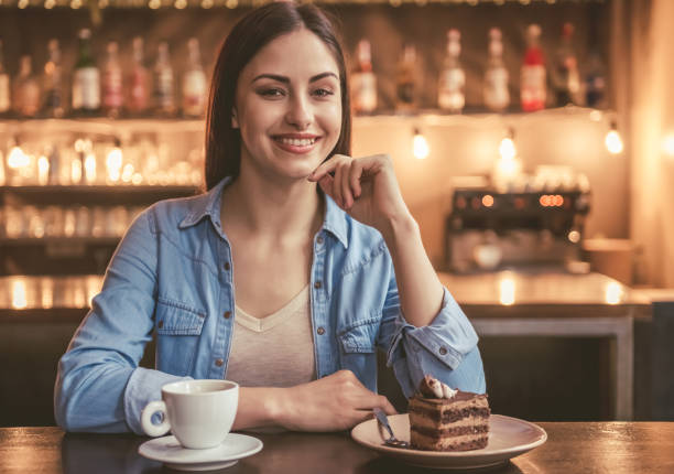 istock Beautiful girl at the cafe 657181894