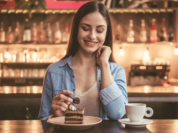 istock Beautiful girl at the cafe 657184540