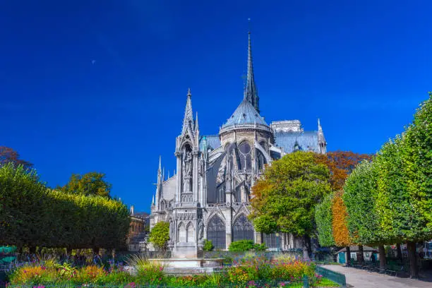 Photo of View beautiful Notre Dame Cathedral with garden, Paris, France.