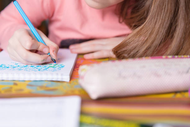 istock Little girl drawing 657188164