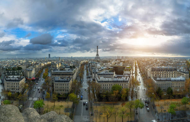 istock Panoramic view of Paris from the Arc de Triomphe. Autumn. Rain. Sun. 657188560