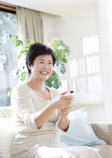 istock Senior woman enjoying video games 657189816