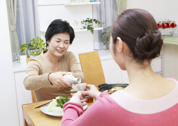istock Daughter and mother around the vegetables cooked in casserole 657194046