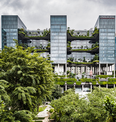 Parkroyal hotel in Singapore Designed by studio WOHA this building is known because the vertical gardens planted in the many balconies of the building. More than 15.000 square meters of lush vegetation are part of this building. This is part of the growing trend to build more sustainable buildings that have less impact on the environment.