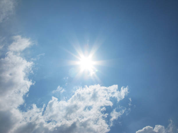 istock Fantastic sun and white clouds on the blue sky photo 657204598
