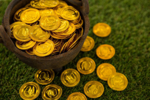 istock St. Patricks Day pot filled with chocolate gold coins 657210780