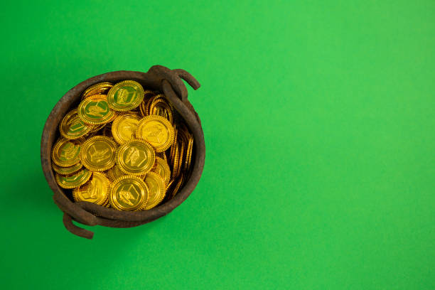 istock St. Patricks Day pot filled with chocolate gold coins 657211334
