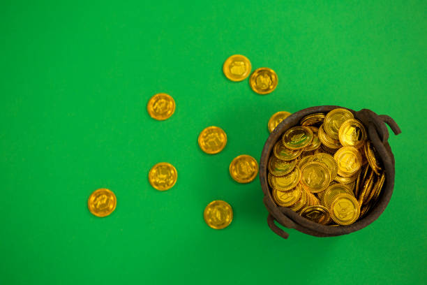 istock St. Patricks Day pot filled with chocolate gold coins 657211380