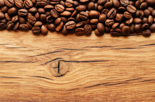 istock Coffee beans on grunge wooden background 657214134