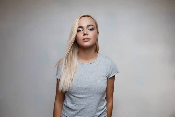 istock Pretty blonde woman posing in light room 657215502