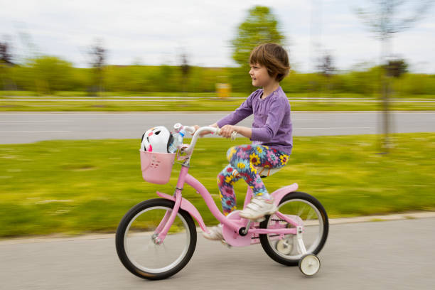 istock Girl learning to ride her bike 657219836