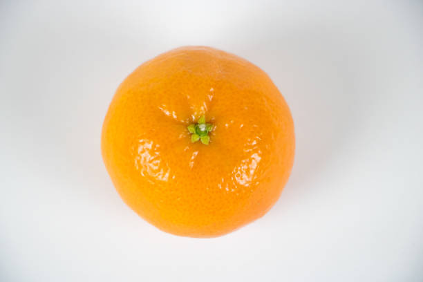istock Fresh Orange Clementine Isolated on White Top View 657224784