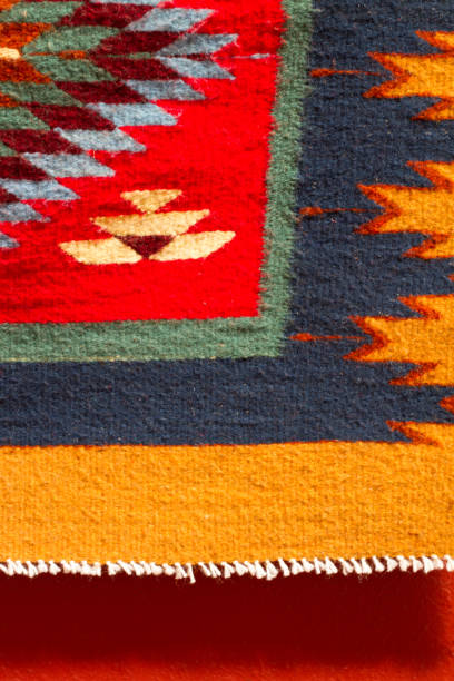 istock Traditional Vibrant Mexican Wool Woven Rug on Red Wall 657225348