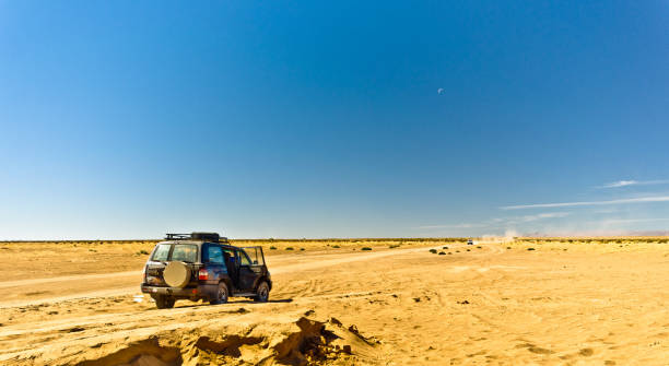 istock Off road Tour with 4x4 SUV car in Morocco desert 657230398
