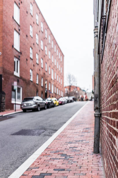 istock Brick alley in Georgetown, Washington DC with parked cars 657233076