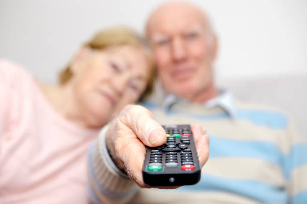 istock Senior Couple Watching Tv 657249464