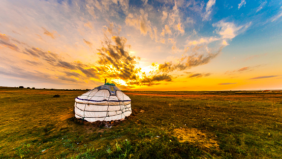 Traditional Yurt tent at the Song Kul lake plateau in Kyrgyzstan. Yurt tents are traditional, portable tents made of felt that are used as a form of accommodation in the country.