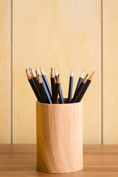 istock Black pencil in wooden storage 657264770