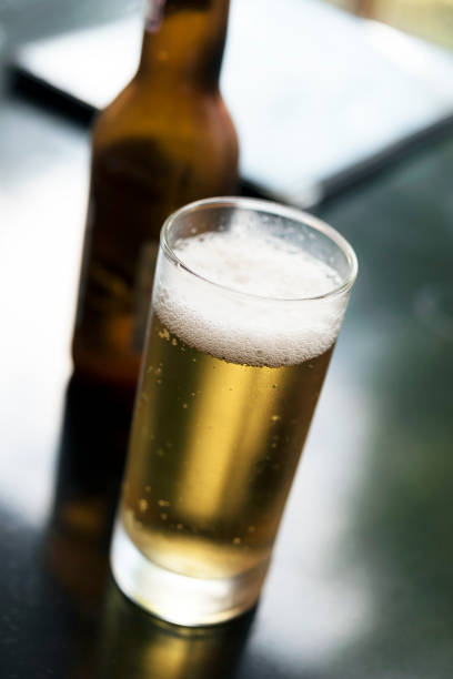istock Glass of beer on table 657274382