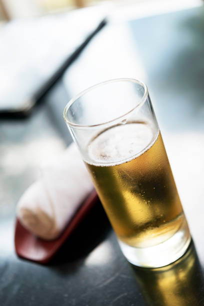 istock Glass of beer on table 657274404