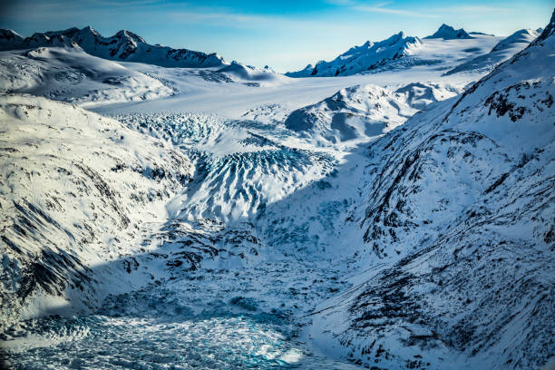 Knik Glacier in Alaska A winter aerial view of Knik Glacier in South Central Alaska.A winter aerial view of Knik Glacier in South Central Alaska.A winter aerial view of Knik Glacier in South Central Alaska. chugach mountains photos stock pictures, royalty-free photos & images