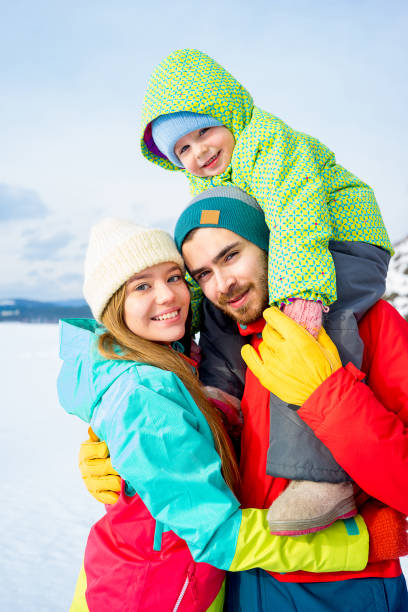 istock Family on a winter lake 657290182