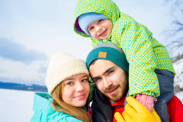istock Family on a winter lake 657290212