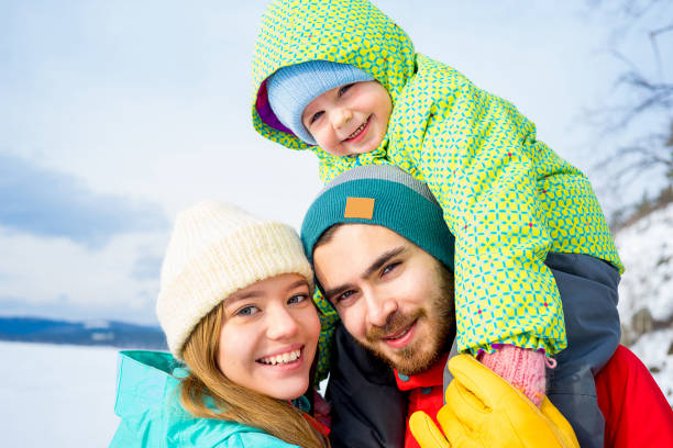 istock Family on a winter lake 657290250