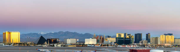 Las Vegas Hotel Casino Buildings Panorama at sunrise Las Vegas, USA - March 16,2017: Panoramic view of Buildings of Las Vegas Hotel & Casino buildings at sunrise. Las Vegas is one of the most popular travel destinations in the world and famous for entertainment and live  night show. Located about 5 hours east of Los Angeles. las vegas metropolitan area luxor luxor hotel pyramid stock pictures, royalty-free photos & images