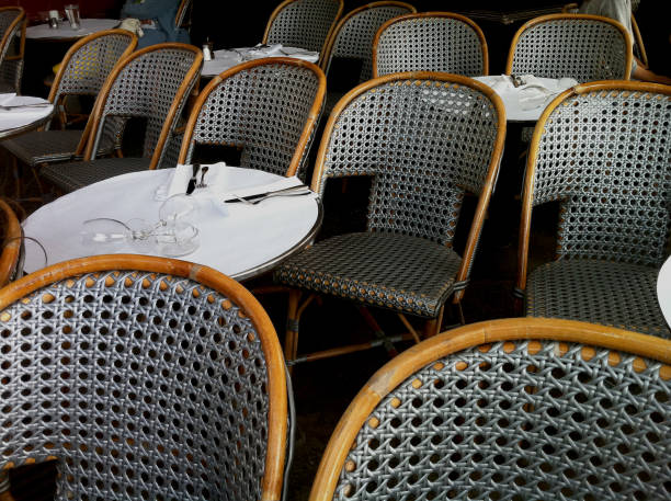 istock Outdoor Paris cafe tables and chairs 657293074
