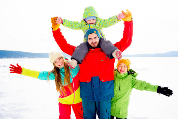 istock Family on a winter lake 657293108