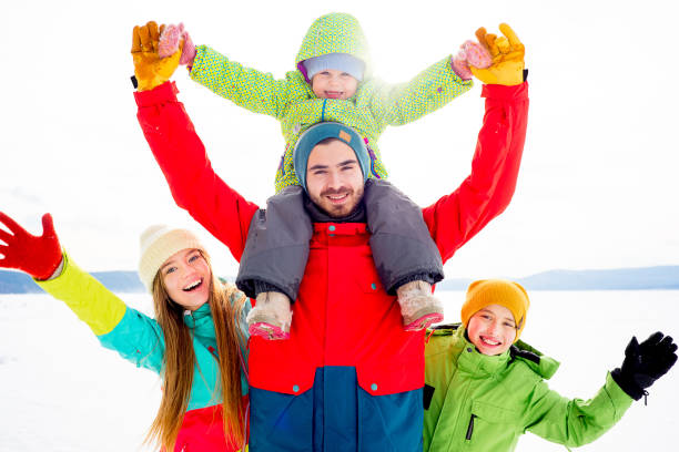 istock Family on a winter lake 657293146