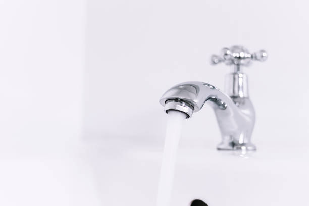 istock Water tap with water Flowing Bathroom sink 657293182