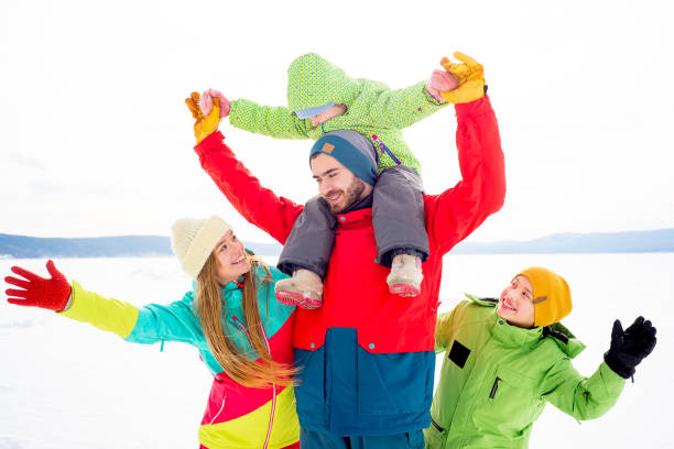 istock Family on a winter lake 657293216