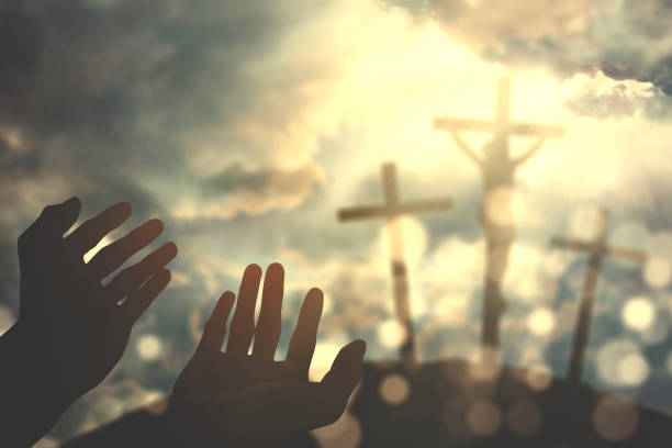 istock Hands praying to the God in the hill 657296378