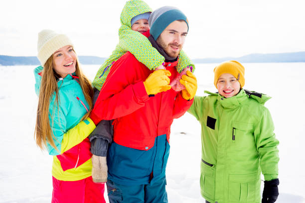 istock Family on a winter lake 657304198