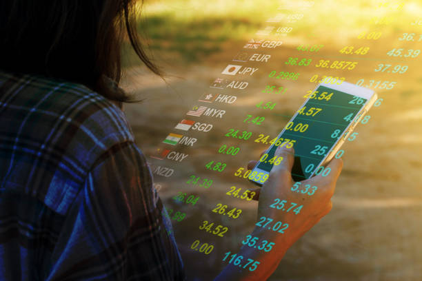 istock world currencies on smartphone 657304588