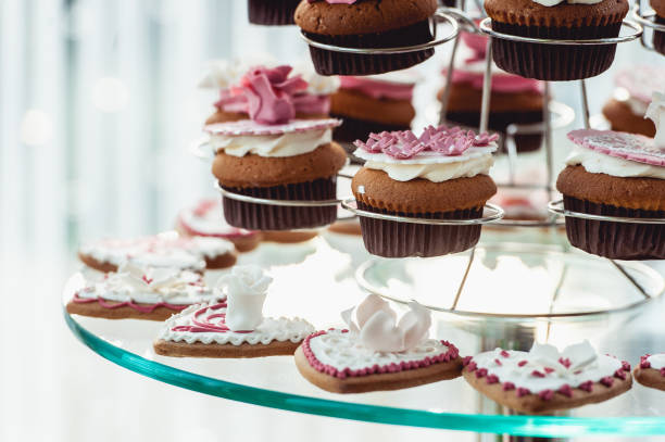 istock Cute candy bar with various candies and cakes. Wedding candybar 657320266