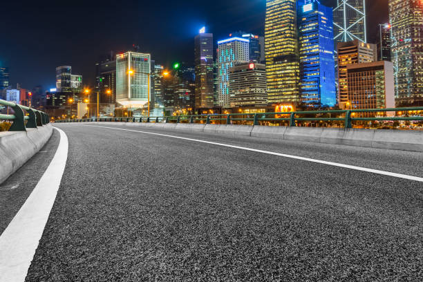 istock urban traffic with cityscape 657320302